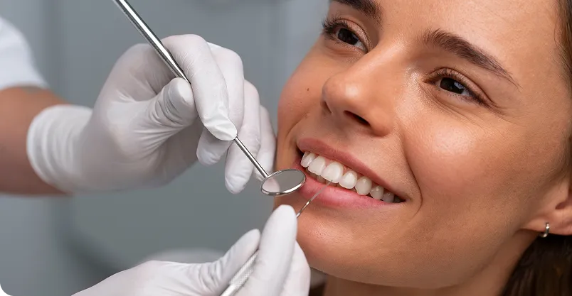 Happy patient pointing to smile